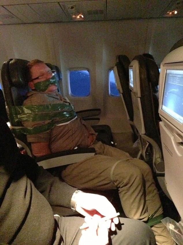 Drunk-Passenger-Lands-at-JFK-Taped-to-His-Seat-After-Mid-Air-Shenanigans-Photo-2.jpg