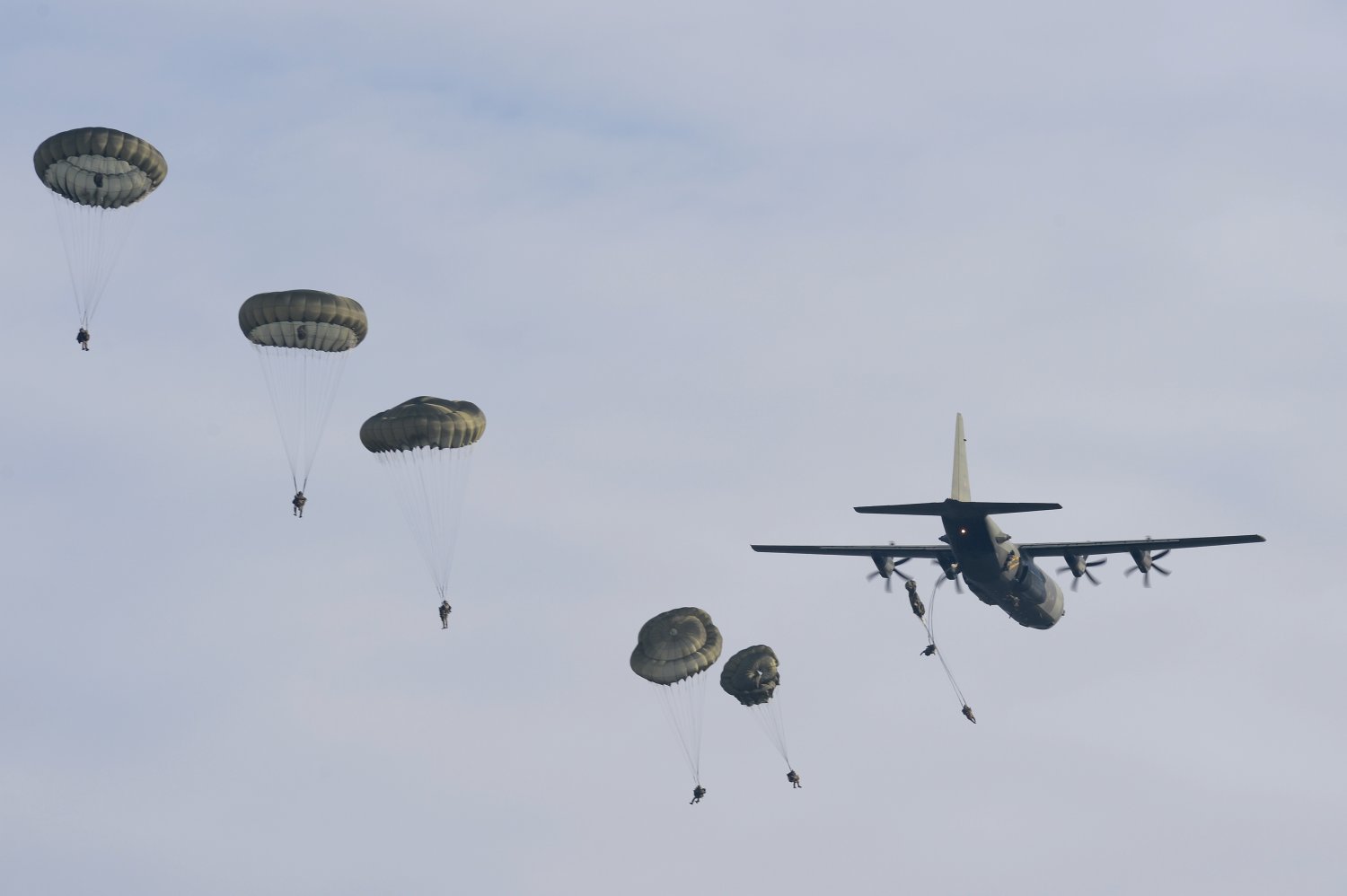 Paratroopers_Jumping_from_a_Hercules_Aircraft_MOD_45158310.jpg