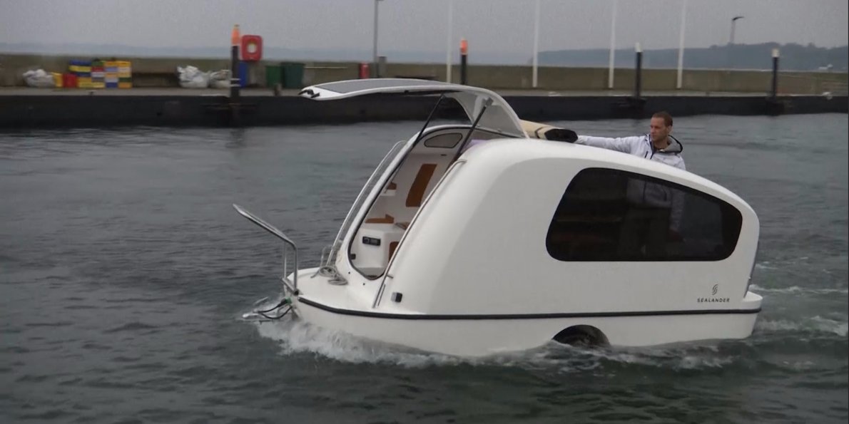 this-20000-camping-trailer-turns-into-a-boat.jpg