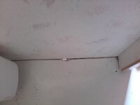 Inside shower looking down - opposite side to damaged board and joins.jpg