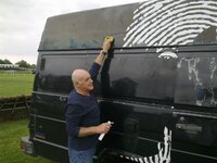 Eddie Polishes Wagon Ready for Race.jpg